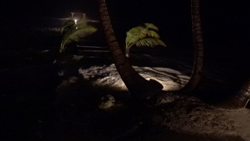 The storm picked up strength by 10 PM. Our dock is stll there, with waves now washing clear over the storm wall.