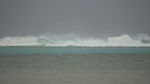 Waves already breaking over the reef 10 to 15 feet high, 800 yards out.